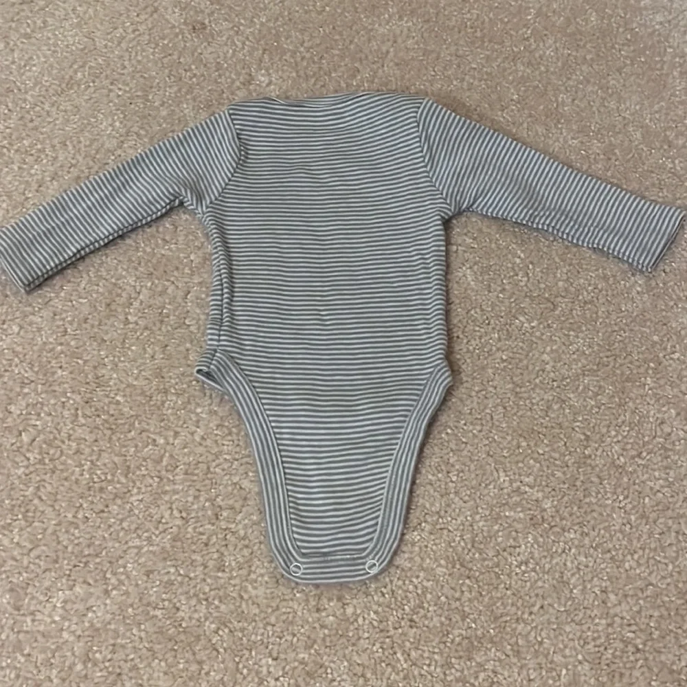 Five NB Animal style Onesies